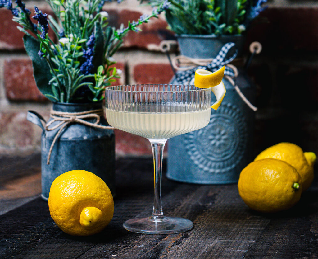 Vya Lido cocktail with lemons and lavender bouquets
